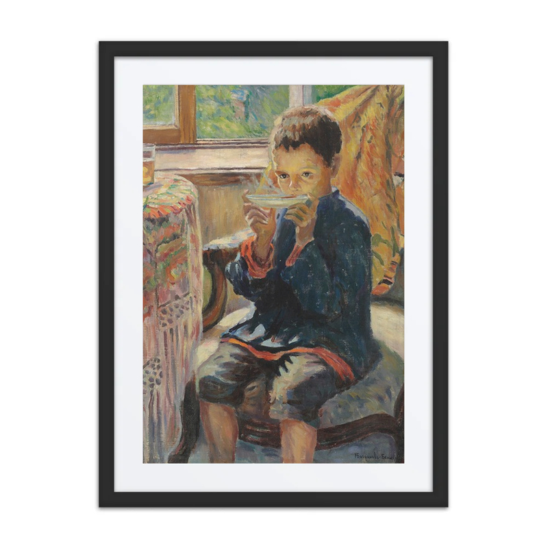 A Young Boy Drinking Tea