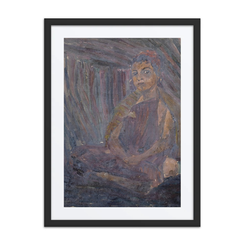 Hockender Beduinenjunge in Zelt