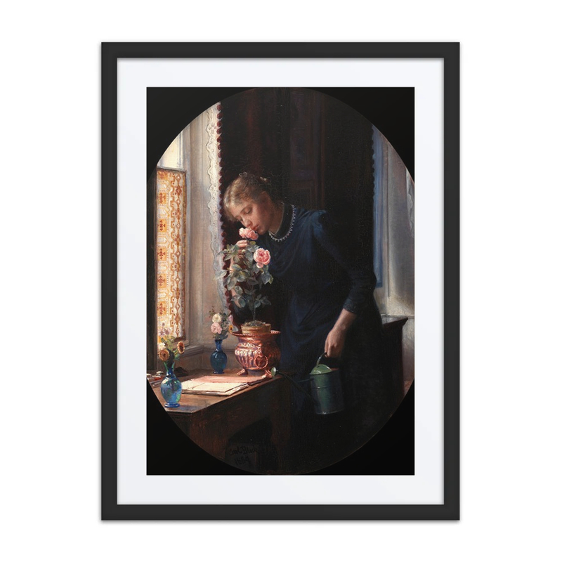 Young Woman Smelling a Rose